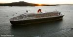 ID 3733 QUEEN MARY 2 (2003/148528grt/IMO 9241061) passing Rangitoto Island, approaches Auckland, New Zealand at sunrise, under the command of her NZ skipper Captain Christopher Rynd. She was making her maiden...